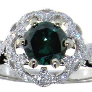 Green Diamond Ring set in 14K White gold; size 6